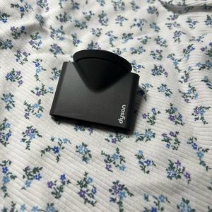 Dyson supersonic smoothing nozzle.